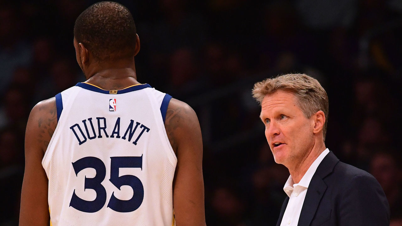 LOS ANGELES, CA - NOVEMBER 29: Steve Kerr of the Golden State Warriors looks at Kevin Durant #35 during the fourth quarter against the Los Angeles Lakers at Staples Center on November 29, 2017 in Los Angeles, California. The Warriors would win 127-123 in overtime.
