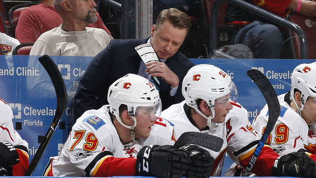 SUNRISE, FL - FEBRUARY 24: Head coach Glen Gulutzan of the Calgary Flames directs the players during first period action against the Florida Panthers at the BB&T Center on February 24, 2017 in Sunrise, Florida. The Flames defeated the Panthers 4-2.