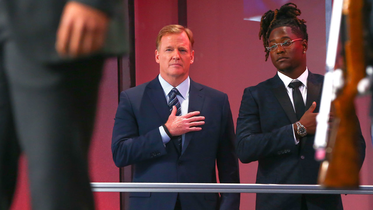 ARLINGTON, TX - APRIL 26: NFL Commissioner Roger Goodell stands next to Shaquem Griffin both with hands over their hearts during the National Anthem prior to the First Round of the 2018 NFL Draft on April 26, 2018 at AT&T Stadium in Arlington Texas. ( Rich Graessle/Icon Sportswire via Getty Images)