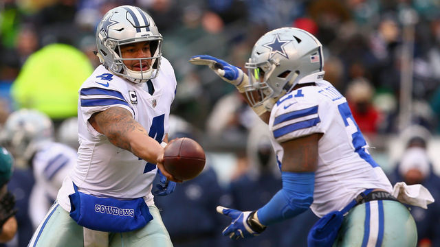 PHILADELPHIA, PA - DECEMBER 31: Quarterback Dak Prescott #4 of the Dallas Cowboys hands off the ball to running back Ezekiel Elliott #21 against the Philadelphia Eagles during the second quarter of the game at Lincoln Financial Field on December 31, 2017 in Philadelphia, Pennsylvania.