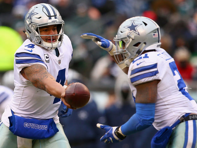 PHILADELPHIA, PA - DECEMBER 31: Quarterback Dak Prescott #4 of the Dallas Cowboys hands off the ball to running back Ezekiel Elliott #21 against the Philadelphia Eagles during the second quarter of the game at Lincoln Financial Field on December 31, 2017 in Philadelphia, Pennsylvania.