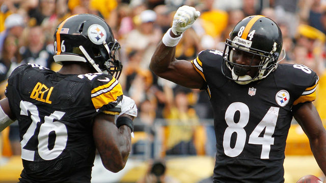 PITTSBURGH, PA - SEPTEMBER 28: Antonio Brown #84 celebrates his touchdown with Le'Veon Bell #26 of the Pittsburgh Steelers during the first quarter against the Tampa Bay Buccaneers at Heinz Field on September 28, 2014 in Pittsburgh, Pennsylvania.