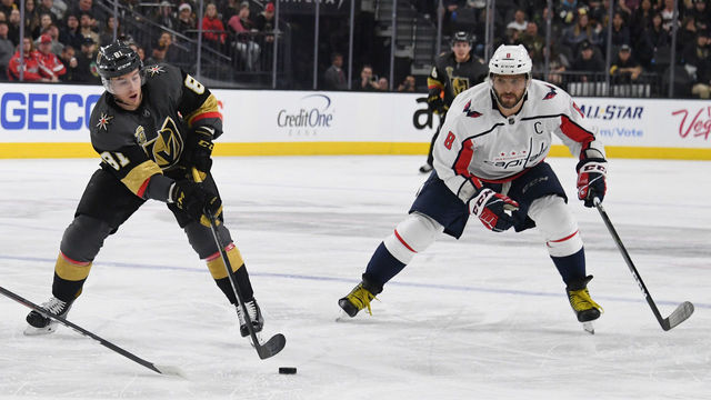 LAS VEGAS, NV - DECEMBER 23: Jonathan Marchessault #81 of the Vegas Golden Knights passes under pressure from Alex Ovechkin #8 of the Washington Capitals during the second period of their game at T-Mobile Arena on December 23, 2017 in Las Vegas, Nevada. The Golden Knights won 3-0.