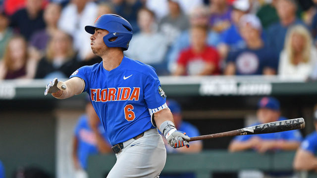 OMAHA, NE - JUNE 26: Third basemen Jonathan India #6 of the Florida Gators hits a two run double against the LSU Tigers in the third inning during game one of the College World Series Championship Series on June 26, 2017 at TD Ameritrade Park in Omaha, Nebraska.