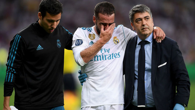 KIEV, UKRAINE - MAY 26: Daniel Carvajal of Real Madrid leaves the pitch in tears as he goes off injured during the UEFA Champions League Final between Real Madrid and Liverpool at NSC Olimpiyskiy Stadium on May 26, 2018 in Kiev, Ukraine.