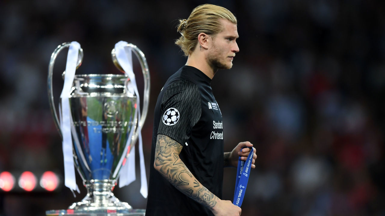 KIEV, UKRAINE - MAY 26: Loris Karius of Liverpool walks past the trophy looking dejected after the UEFA Champions League Final between Real Madrid and Liverpool at NSC Olimpiyskiy Stadium on May 26, 2018 in Kiev, Ukraine.