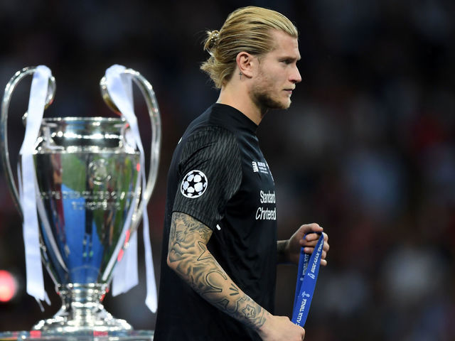 KIEV, UKRAINE - MAY 26: Loris Karius of Liverpool walks past the trophy looking dejected after the UEFA Champions League Final between Real Madrid and Liverpool at NSC Olimpiyskiy Stadium on May 26, 2018 in Kiev, Ukraine.