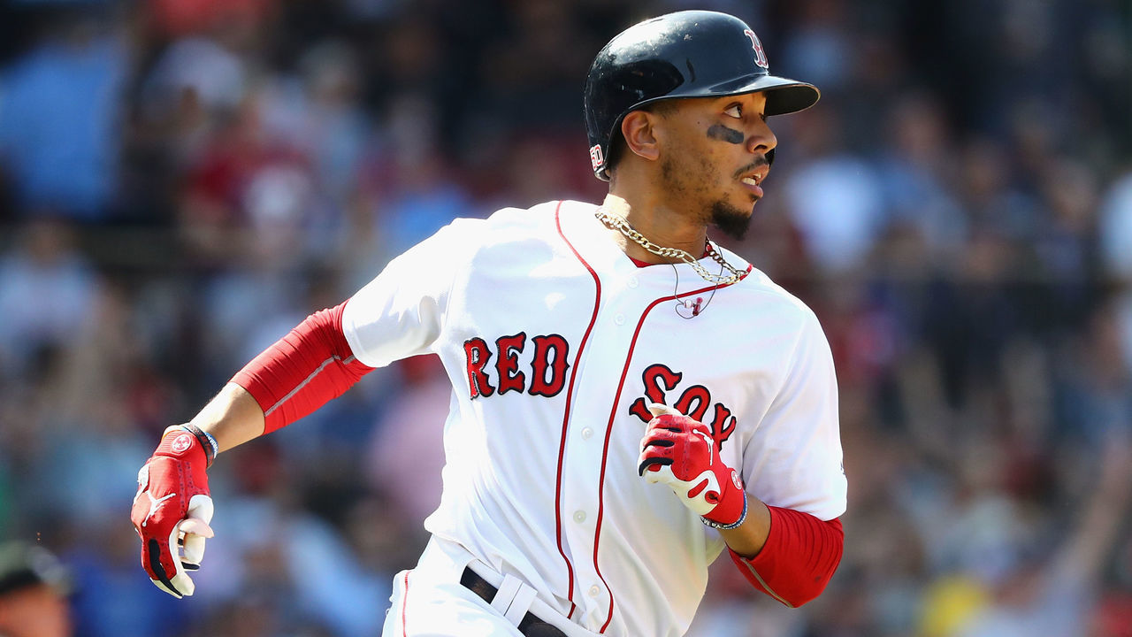 BOSTON, MA - MAY 02: Mookie Betts #50 of the Boston Red Sox runs the bases after hitting a solo home run during the seventh inning against the Kansas City Royals at Fenway Park on May 2, 2018 in Boston, Massachusetts.