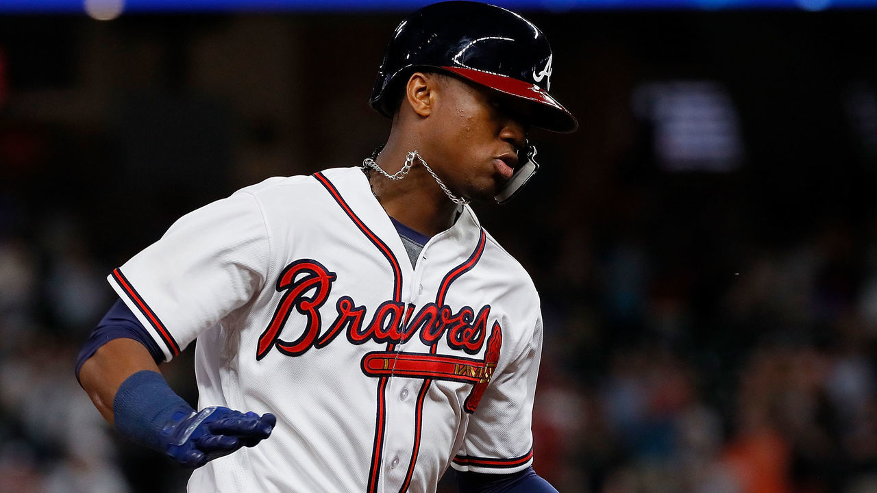 ATLANTA, GA - MAY 15: Ronald Acuna Jr. #13 of the Atlanta Braves rounds third base after hitting a solo homer in the eighth inning against the Chicago Cubs at SunTrust Park on May 15, 2018 in Atlanta, Georgia.