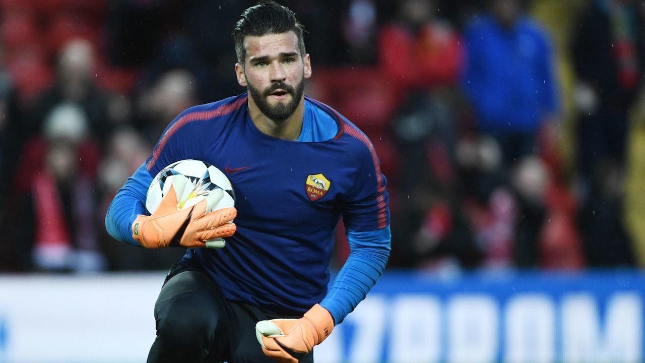 Roma's Brazilian goalkeeper Alisson warms up before the UEFA Champions League first leg semi-final football match between Liverpool and Roma at Anfield stadium in Liverpool, north west England on April 24, 2018.