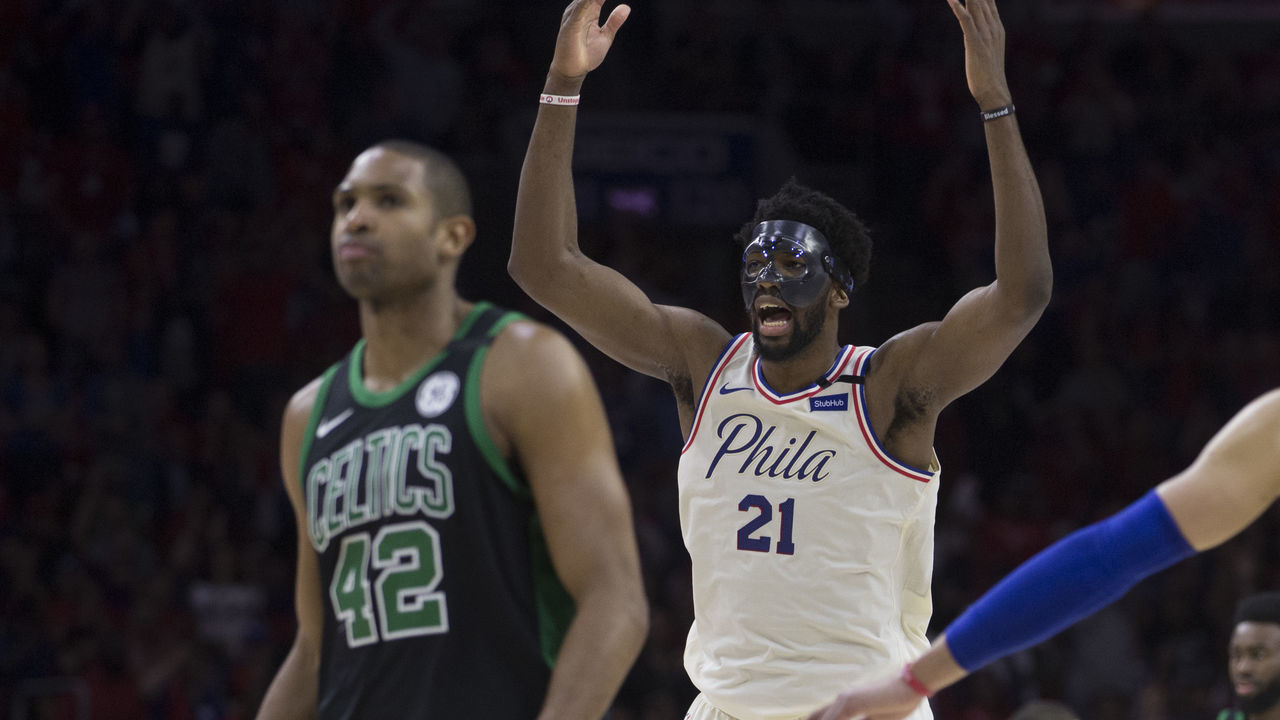 PHILADELPHIA, PA - MAY 7: Joel Embiid #21 of the Philadelphia 76ers reacts in front of Al Horford #42 of the Boston Celtics after making a three point basket in the second quarter during Game Four of the Eastern Conference Second Round of the 2018 NBA Playoffs at Wells Fargo Center on May 7, 2018 in Philadelphia, Pennsylvania.