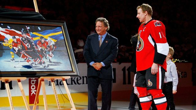 OTTAWA - APRIL 10: Daniel Alfredsson #11 of the Ottawa Senators and team owner Eugene Melnyk look on prior to the NHL game against the Buffalo Sabres at Scotiabank Place on April 10, 2010 in Ottawa, Ontario, Canada. The Sabres defeated the Senators 5-2.