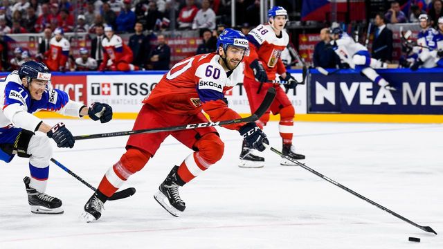 Czech Republic's Michal Moravcik (R) vies with Slovakia's Marek Daloga during the group A match Czech Republic vs Slovakia of the 2018 IIHF Ice Hockey World Championship at the Royal Arena in Copenhagen, Denmark, on May 5, 2018.