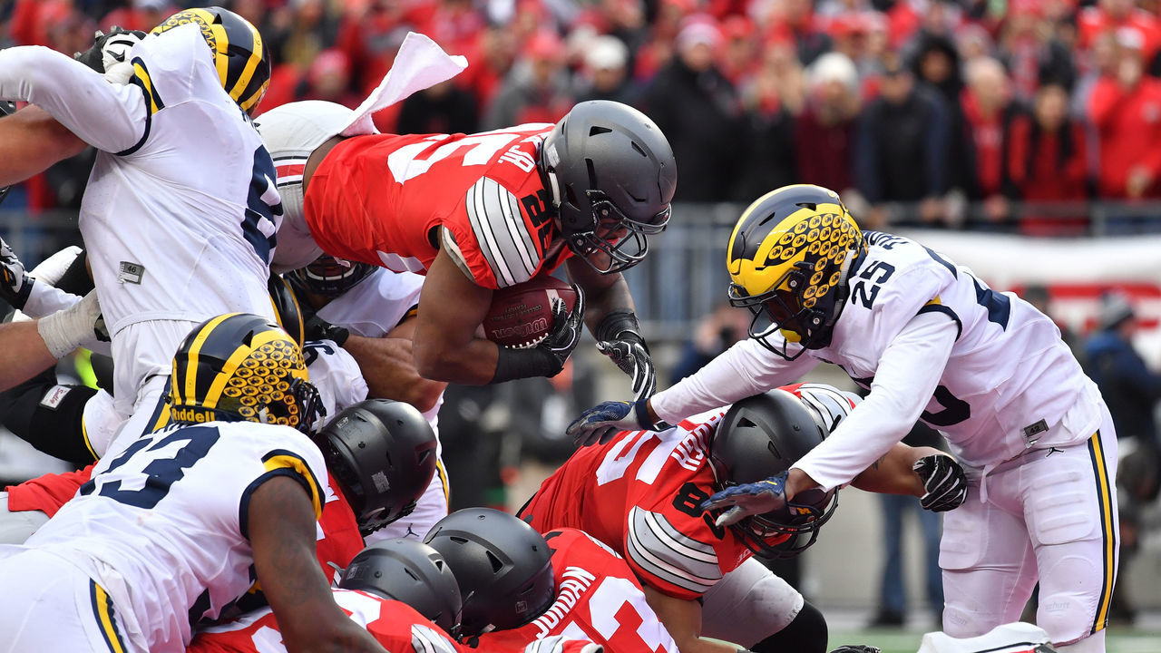 COLUMBUS, OH - NOVEMBER 26: Mike Weber #25 of the Ohio State Buckeyes dives into the end zone for a touchdown during the second half against the Michigan Wolverines at Ohio Stadium on November 26, 2016 in Columbus, Ohio.