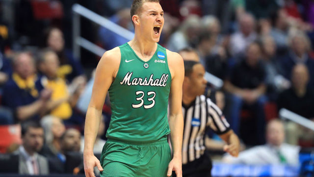 SAN DIEGO, CA - MARCH 16: Jon Elmore #33 of the Marshall Thundering Herd reacts after a three point basket in the second half against the Wichita State Shockers during the first round of the 2018 NCAA Men's Basketball Tournament at Viejas Arena on March 16, 2018 in San Diego, California.