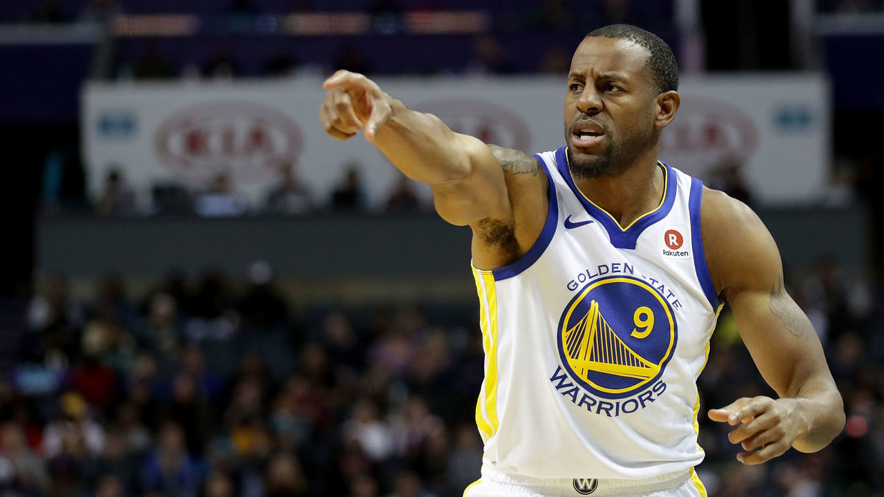 CHARLOTTE, NC - DECEMBER 06: Andre Iguodala #9 of the Golden State Warriors reacts against the Charlotte Hornets during their game at Spectrum Center on December 6, 2017 in Charlotte, North Carolina.