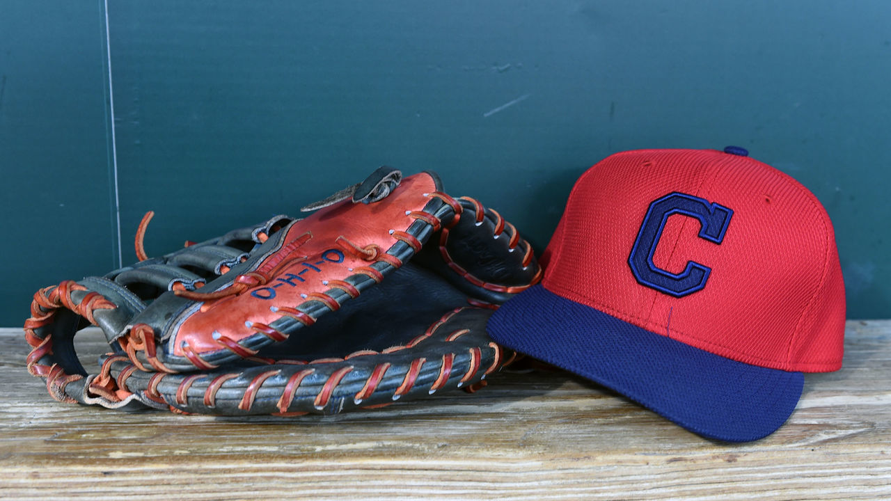 BALTIMORE, MD - JUNE 26: A Cleveland Indians cap and glove sit in the dug out before a baseball game between the Baltimore Orioles and the Cleveland Indians at Oriole Park at Camden Yards on June 26, 2015 in Baltimore, Maryland.
