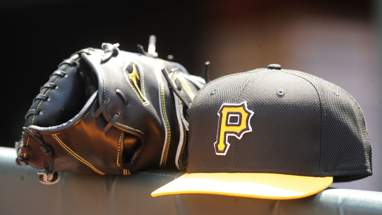 BALTIMORE, MD - MAY 1: Pittsburgh Pirates cap and glove on rail before game one of a doubleheader against the Baltimore Orioles on May 1, 2014 at Oriole Park at Camden Yards in Baltimore, Maryland.