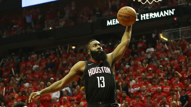 HOUSTON, TX - MAY 28: James Harden #13 of the Houston Rockets dunks against Jordan Bell #2 of the Golden State Warriors in the second quarter of Game Seven of the Western Conference Finals of the 2018 NBA Playoffs at Toyota Center on May 28, 2018 in Houston, Texas.