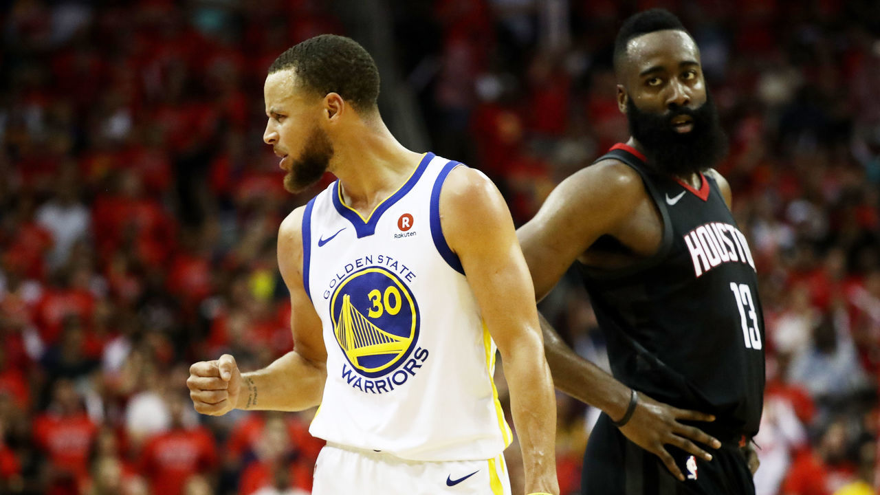 HOUSTON, TX - MAY 28: Stephen Curry #30 of the Golden State Warriors reacts as James Harden #13 of the Houston Rockets looks on in the third quarter of Game Seven of the Western Conference Finals of the 2018 NBA Playoffs at Toyota Center on May 28, 2018 in Houston, Texas.