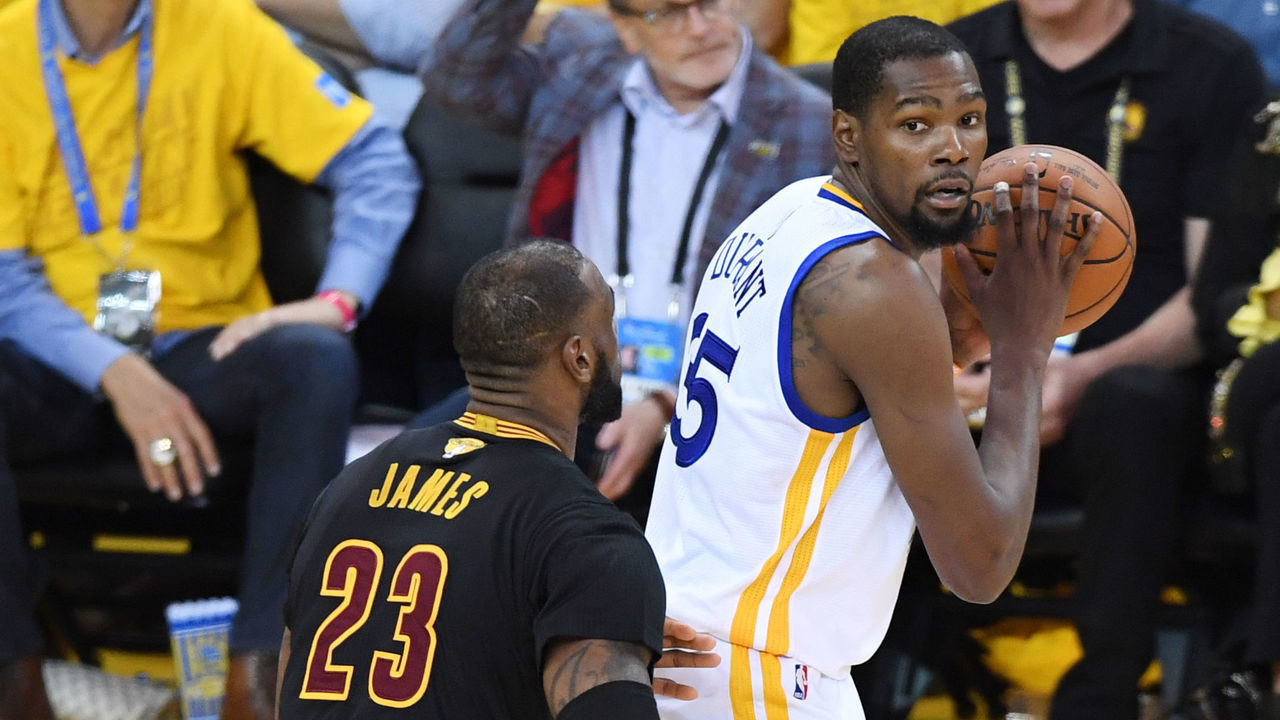 OAKLAND, CA - JUNE 12: Kevin Durant #35 of the Golden State Warriors is defended by LeBron James #23 of the Cleveland Cavaliers during the second half in Game 5 of the 2017 NBA Finals at ORACLE Arena on June 12, 2017 in Oakland, California.