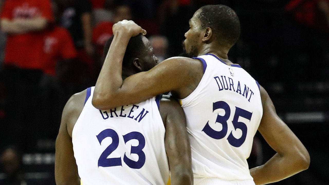 HOUSTON, TX - MAY 28: Draymond Green #23 and Kevin Durant #35 of the Golden State Warriors react in the fourth quarter of Game Seven of the Western Conference Finals of the 2018 NBA Playoffs against the Houston Rockets at Toyota Center on May 28, 2018 in Houston, Texas.