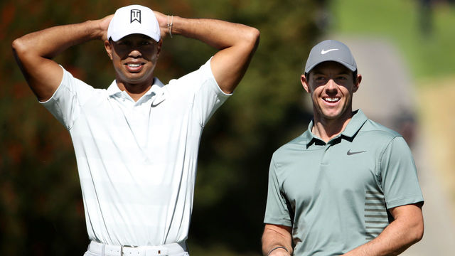 PACIFIC PALISADES, CA - FEBRUARY 16: Tiger Woods and Rory McIlroy of Northern Ireland meet at the fourth tee during the second round of the Genesis Open at Riviera Country Club on February 16, 2018 in Pacific Palisades, California.
