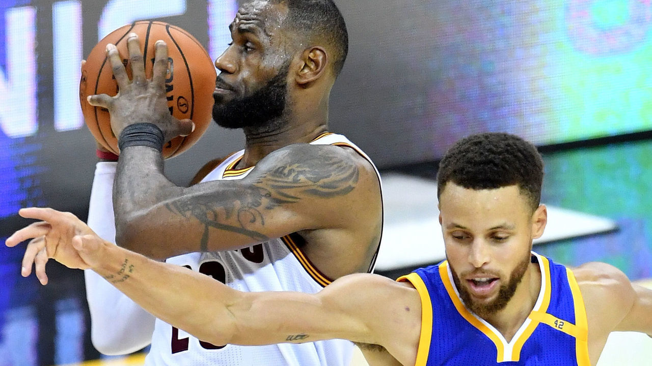 CLEVELAND, OH - JUNE 09: LeBron James #23 of the Cleveland Cavaliers handles the ball against Stephen Curry #30 of the Golden State Warriors in the fourth quarter in Game 4 of the 2017 NBA Finals at Quicken Loans Arena on June 9, 2017 in Cleveland, Ohio.