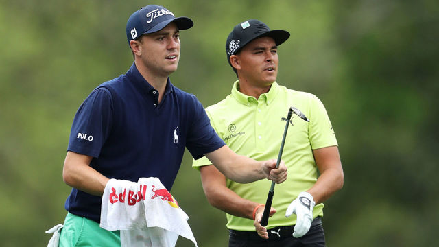 AUGUSTA, GA - APRIL 04: Justin Thomas of the United States caddies for Rickie Fowler during a practice round prior to the start of the 2018 Masters Tournament at Augusta National Golf Club on April 4, 2018 in Augusta, Georgia.
