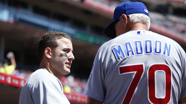 CINCINNATI, OH - APRIL 24: Anthony Rizzo #44 of the Chicago Cubs talks with manager Joe Maddon after hitting his second home run of the game against the Cincinnati Reds at Great American Ball Park on April 24, 2016 in Cincinnati, Ohio. The Cubs defeated the Reds 9-0.