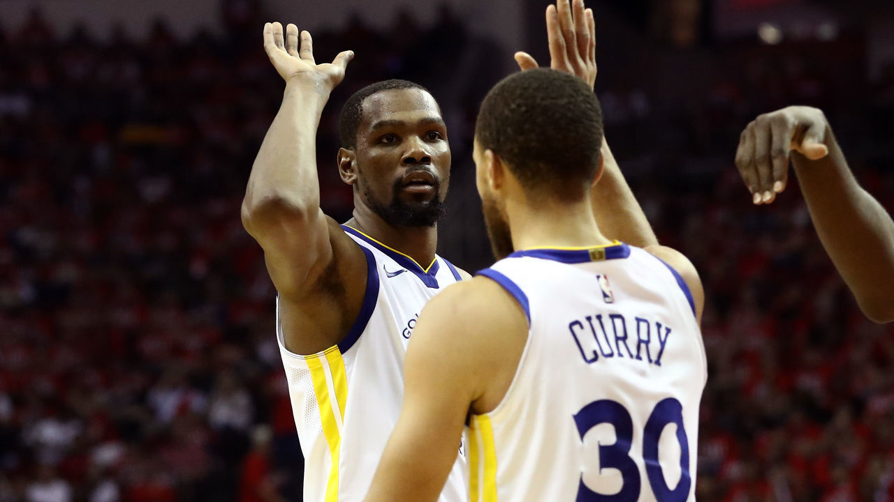 HOUSTON, TX - MAY 14: Kevin Durant #35 and Stephen Curry #30 of the Golden State Warriors react after a play in the third quarter against the Houston Rockets in Game One of the Western Conference Finals of the 2018 NBA Playoffs at Toyota Center on May 14, 2018 in Houston, Texas.