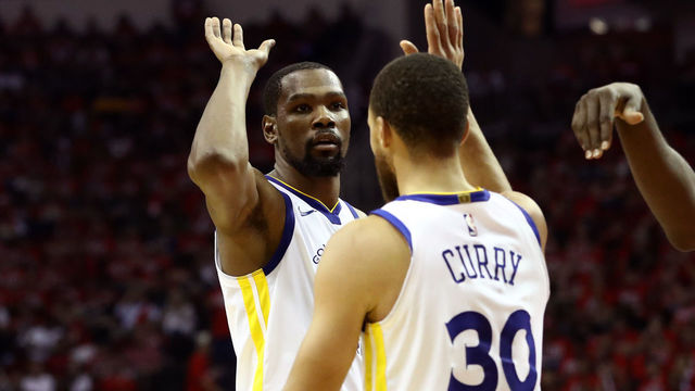 HOUSTON, TX - MAY 14: Kevin Durant #35 and Stephen Curry #30 of the Golden State Warriors react after a play in the third quarter against the Houston Rockets in Game One of the Western Conference Finals of the 2018 NBA Playoffs at Toyota Center on May 14, 2018 in Houston, Texas.