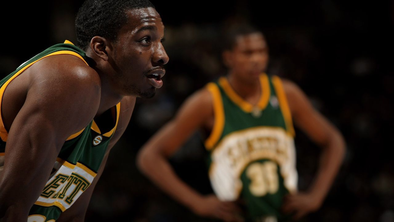 DENVER - MARCH 16: Jeff Green #22 and Kevin Durant #35 of the Seattle SuperSonics await action against the Denver Nuggets at the Pepsi Center on March 16, 2008 in Denver, Colorado. The Nuggets defeated the Sonics 168-116. NOTE TO USER: User expressly acknowledges and agrees that, by downloading and or using this photograph, user is consenting to the term and conditions of the Getty Images License Agreement.