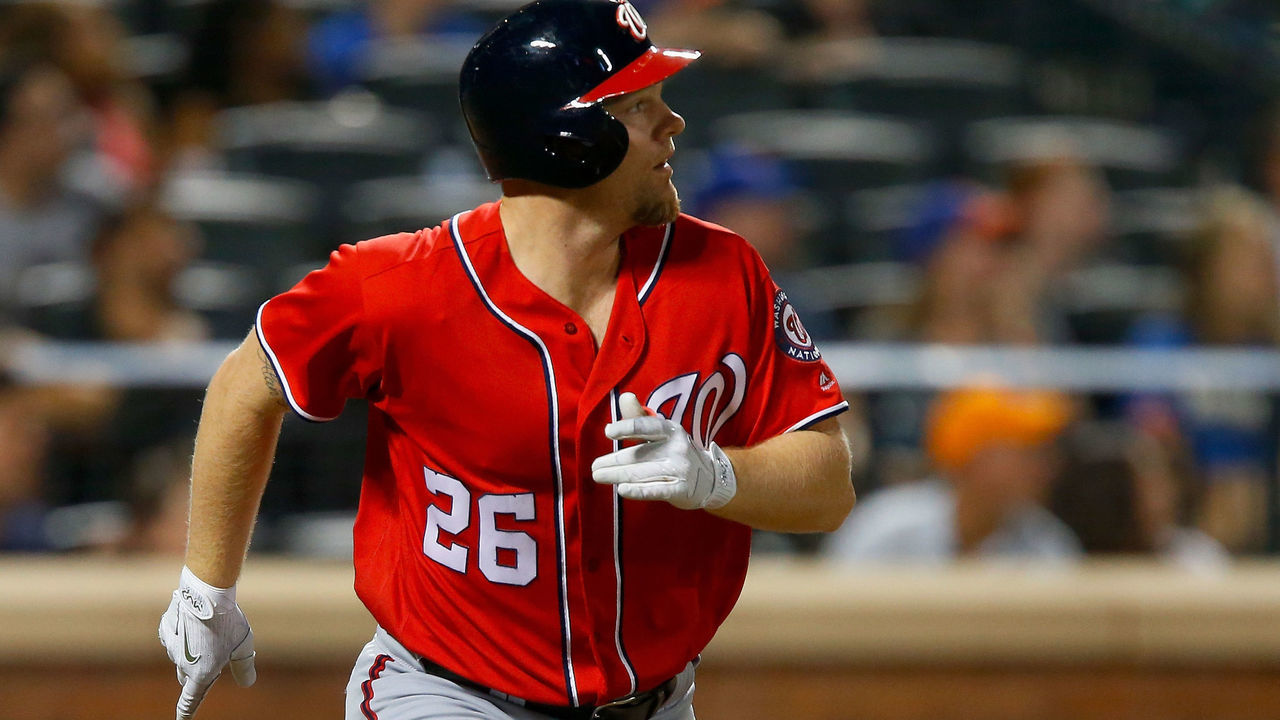 NEW YORK, NY - SEPTEMBER 23: Adam Lind #26 of the Washington Nationals watches the flight of his fourth inning two run home run against the New York Mets at Citi Field on September 23, 2017 in the Flushing neighborhood of the Queens borough of New York City.