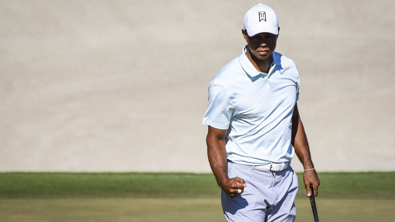 ORLANDO, FL - MARCH 17: Tiger Woods celebrates and pumps his fist after making a birdie putt on the 18th hole green during the third round of the Arnold Palmer Invitational presented by MasterCard at Bay Hill Club and Lodge on March 17, 2018 in Orlando, Florida.