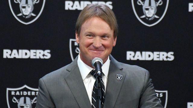 Gruden refutes reports of $100M contract