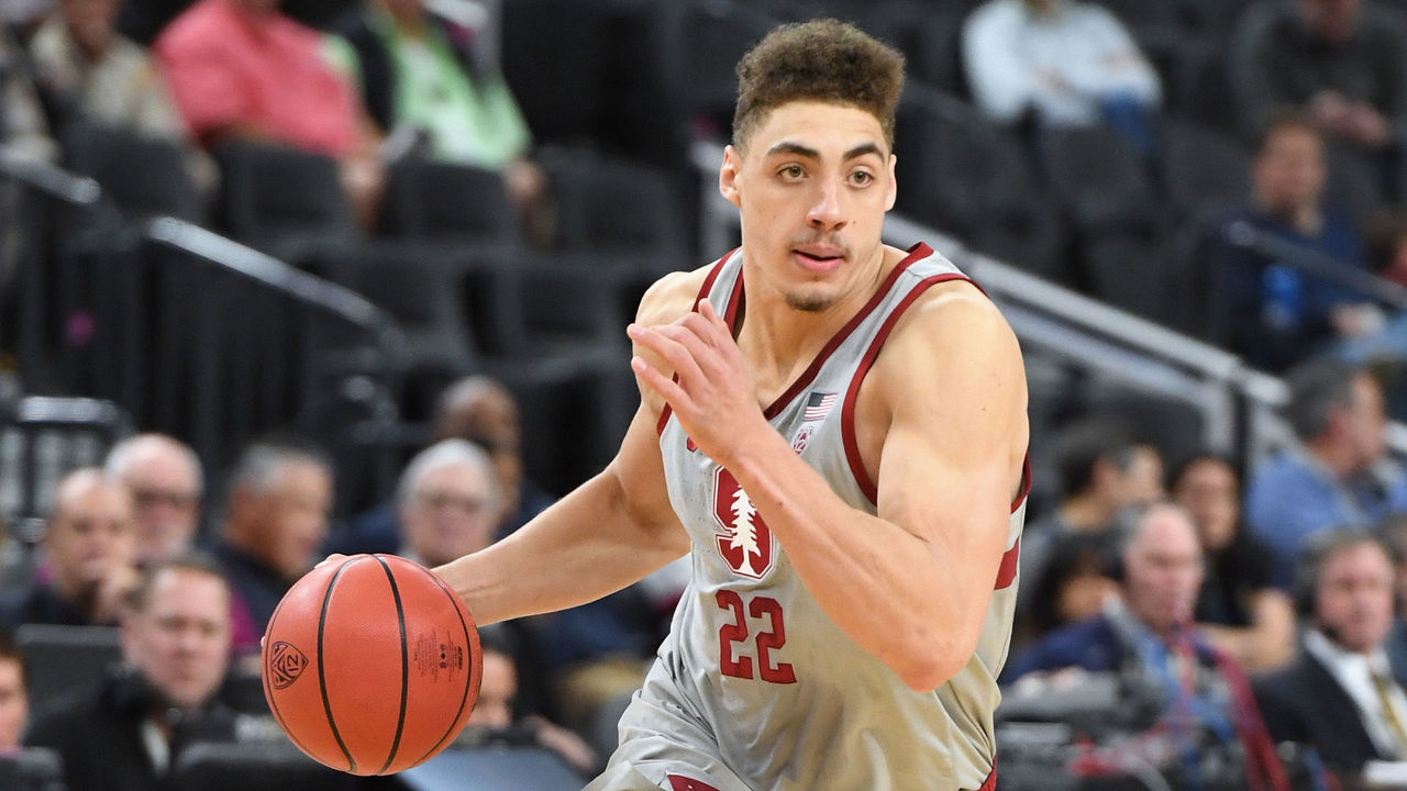 LAS VEGAS, NV - MARCH 07: Reid Travis #22 of the Stanford Cardinal brings the ball up the court agfainst the California Golden Bears during a first-round game of the Pac-12 basketball tournament at T-Mobile Arena on March 7, 2018 in Las Vegas, Nevada. The Cardinal won 76-58.