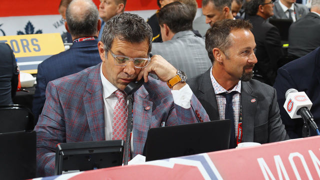 CHICAGO, IL - JUNE 24: (L-R) Mark Bergevin and Trevor Timmins of the Montreal Canadiens work the 2017 in Chicago, Illinois.