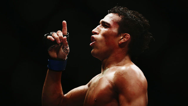 AUCKLAND, NEW ZEALAND - JUNE 28: Charles Oliveira of Brazil celebrates after winning the UFC Featherweight bout between Charles Oliveira of Brazil and Hatsu Hioki of Japan on June 28, 2014 in Auckland, New Zealand.