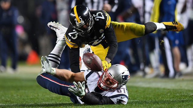PITTSBURGH, PA - DECEMBER 17: Rob Gronkowski #87 of the New England Patriots cannot come up with a catch while being defended by Artie Burns #25 of the Pittsburgh Steelers in the second half during the game at Heinz Field on December 17, 2017 in Pittsburgh, Pennsylvania.