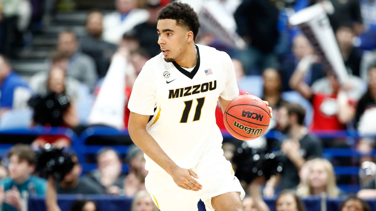 ST LOUIS, MO - MARCH 08: Jontay Porter #11 of the Missouri Tigers dribbles the ball against the Georgia Bulldogs during the second round of the 2018 SEC Basketball Tournament at Scottrade Center on March 8, 2018 in St Louis, Missouri.