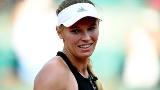 Denmark's Caroline Wozniacki looks on as she celebrates after victory over Spain's Georgina Garcia Perez in their women's singles second round match on day four of The Roland Garros 2018 French Open tennis tournament in Paris on May 30, 2018.