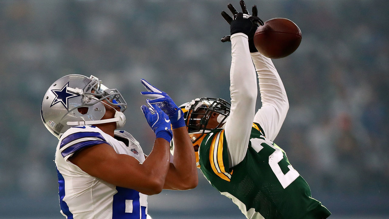 ARLINGTON, TX - OCTOBER 08: Damarious Randall #23 of the Green Bay Packers breaks up a pass intended for Terrance Williams #83 of the Dallas Cowboys late in the fourth quarter of a football game at AT&T Stadium on October 8, 2017 in Arlington, Texas.