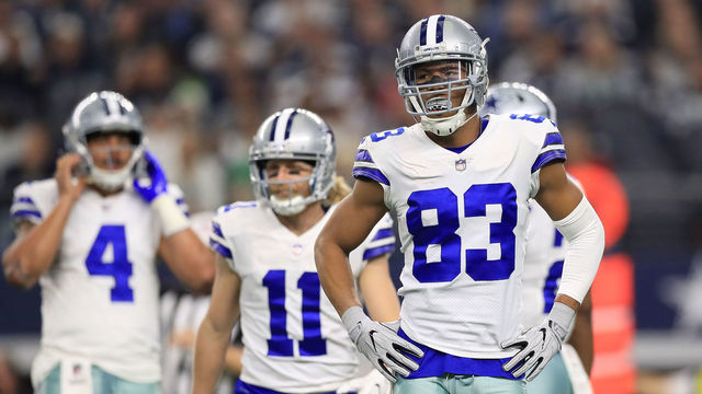 ARLINGTON, TX - DECEMBER 24: Wide receivers Cole Beasley #11, Terrance Williams #83, and Dez Bryant #88 of the Dallas Cowboys walk to the sidelines in the first quarter of a football game against the Seattle Seahawks at AT&T Stadium on December 24, 2017 in Arlington, Texas.