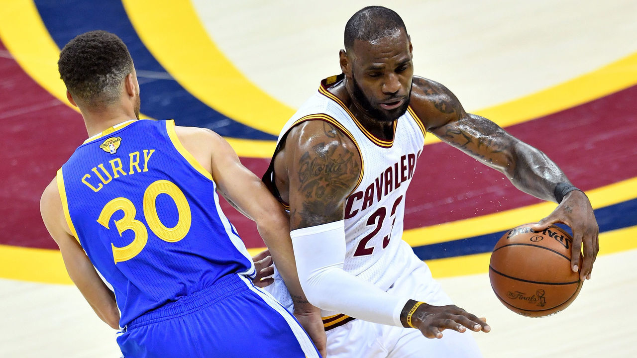 CLEVELAND, OH - JUNE 07: LeBron James #23 of the Cleveland Cavaliers handles the ball against Stephen Curry #30 of the Golden State Warriors in the first quarter in Game 3 of the 2017 NBA Finals at Quicken Loans Arena on June 7, 2017 in Cleveland, Ohio.