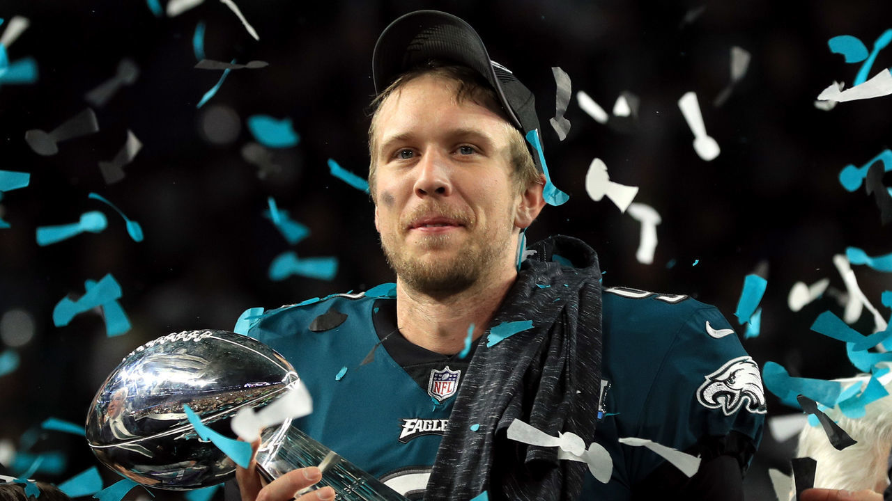 MINNEAPOLIS, MN - FEBRUARY 04: Nick Foles #9 of the Philadelphia Eagles celebrates with the Lombardi Trophy after defeating the New England Patriots 41-33 in Super Bowl LII at U.S. Bank Stadium on February 4, 2018 in Minneapolis, Minnesota.
