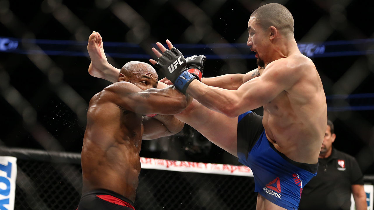 LAS VEGAS, NV - JULY 9: Robert Whittaker kicks Yoel Romero in their interim UFC middleweight championship bout during the UFC 213 event at T-Mobile Arena on July 9, 2017 in Las Vegas, Nevada.