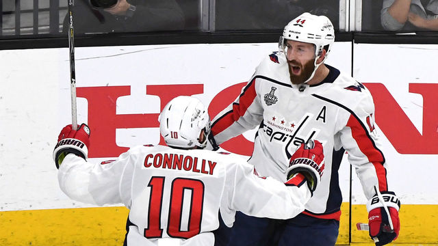 LAS VEGAS, NV - MAY 30: Brooks Orpik #44 of the Washington Capitals is congratulated by his teammate Brett Connolly #10 after scoring a second-period goal against the Vegas Golden Knights in Game Two of the 2018 NHL Stanley Cup Final at T-Mobile Arena on May 30, 2018 in Las Vegas, Nevada.