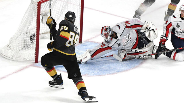 LAS VEGAS, NV - MAY 30: Braden Holtby #70 of the Washington Capitals makes a diving stick-save on Alex Tuch #89 of the Vegas Golden Knights during the third period in Game Two of the 2018 NHL Stanley Cup Final at T-Mobile Arena on May 30, 2018 in Las Vegas, Nevada.