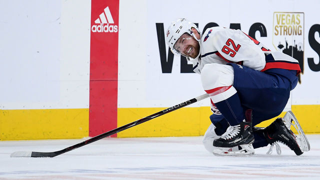LAS VEGAS, NV - MAY 30: Evgeny Kuznetsov #92 of the Washington Capitals reacts after getting injured due to being checked into the boards by Brayden McNabb (not pictured) #3 of the Vegas Golden Knights during the first period in Game Two of the 2018 NHL Stanley Cup Final at T-Mobile Arena on May 30, 2018 in Las Vegas, Nevada.